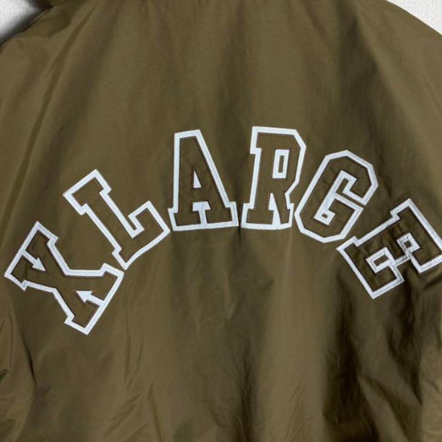 【極美品】エクストララージ くれまぐエア着用 アーチロゴ ナイロンパフジャケット