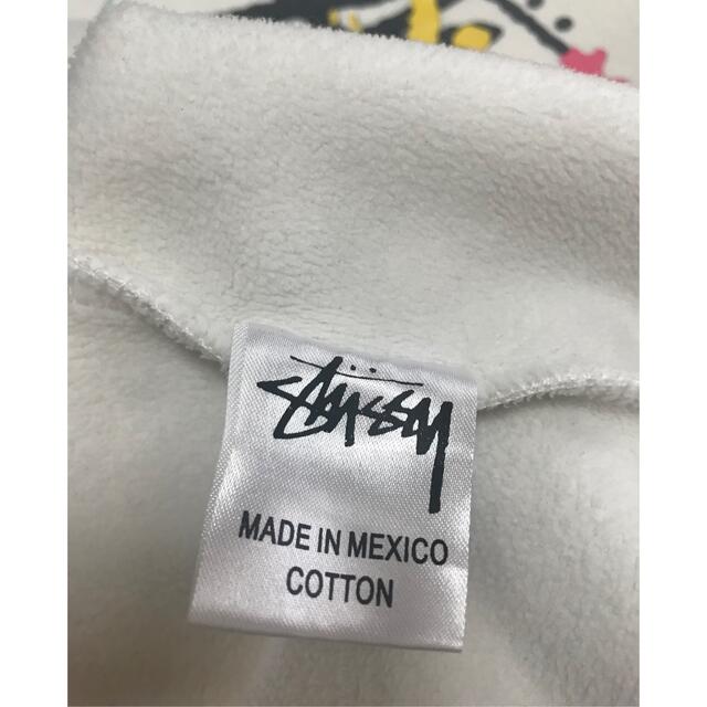 STUSSY(ステューシー)のSTUSSY ステューシー   フードパーカー　ペイント柄　白 レディースのトップス(パーカー)の商品写真