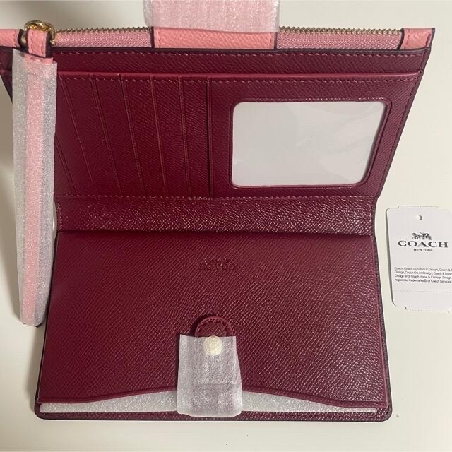 COACH(コーチ)の在庫一掃【新品・未使用】COACH クロスグレイン ウォレット　ピンク×レッド レディースのファッション小物(財布)の商品写真