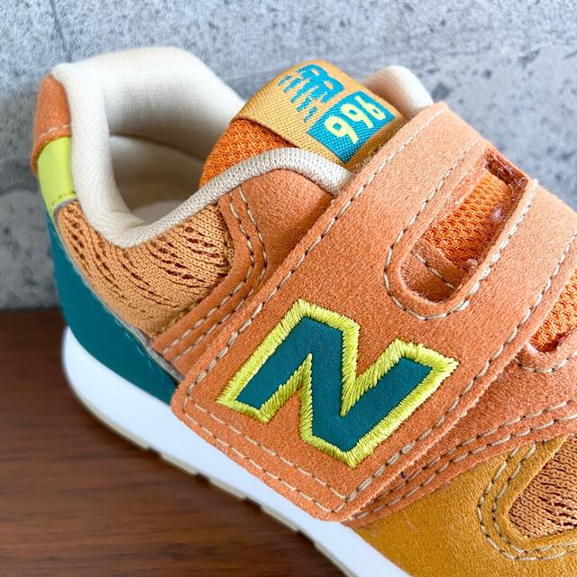 New Balance(ニューバランス)の【新品】14.5センチ オレンジタイガー ニューバランス スニーカー キッズ キッズ/ベビー/マタニティのベビー靴/シューズ(~14cm)(スニーカー)の商品写真