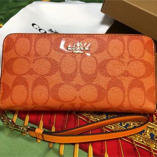 コーチ(COACH)のえぬ様専用COACH 長財布シグネチャー　オレンジ(財布)