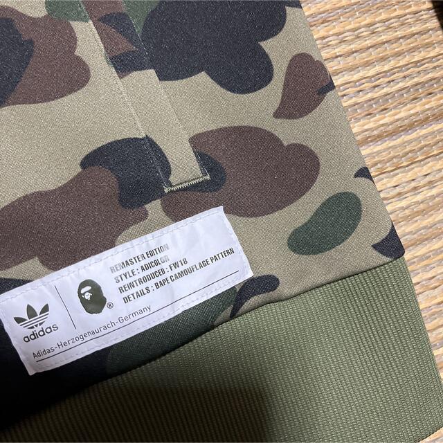 A BATHING APE(アベイシングエイプ)のAPE BAPE KAWS adidas camo 迷彩　m トラックジャケット メンズのトップス(ジャージ)の商品写真