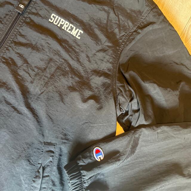 Supreme(シュプリーム)のsupreme x Champion ナイロントラックジャケット★Mシュプリーム メンズのジャケット/アウター(ナイロンジャケット)の商品写真