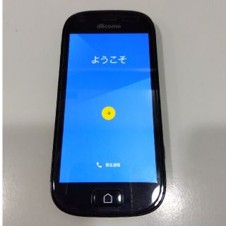 フジツウ(富士通)のDOCOMOらくらくフォン　F-04J　黒+充電スタンド(スマートフォン本体)