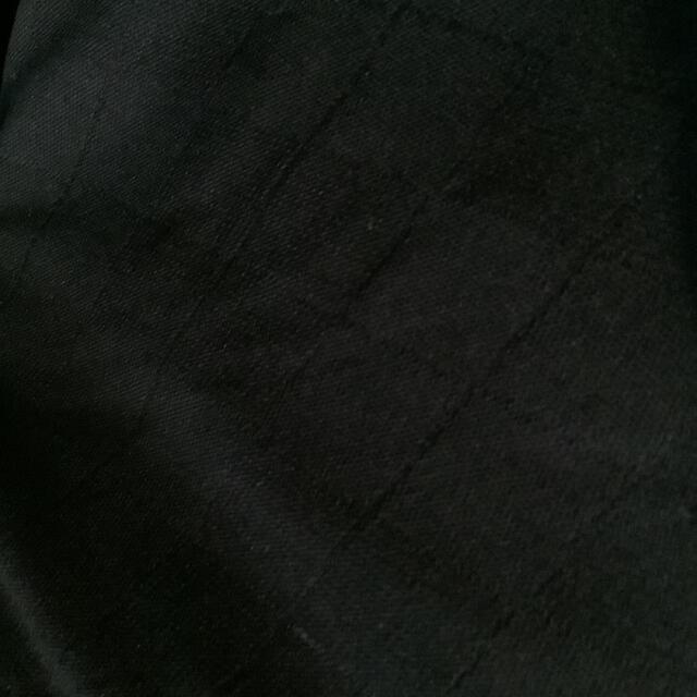 UNIQLO(ユニクロ)の菱型地模様の黒ポロシャツ メンズのトップス(ポロシャツ)の商品写真