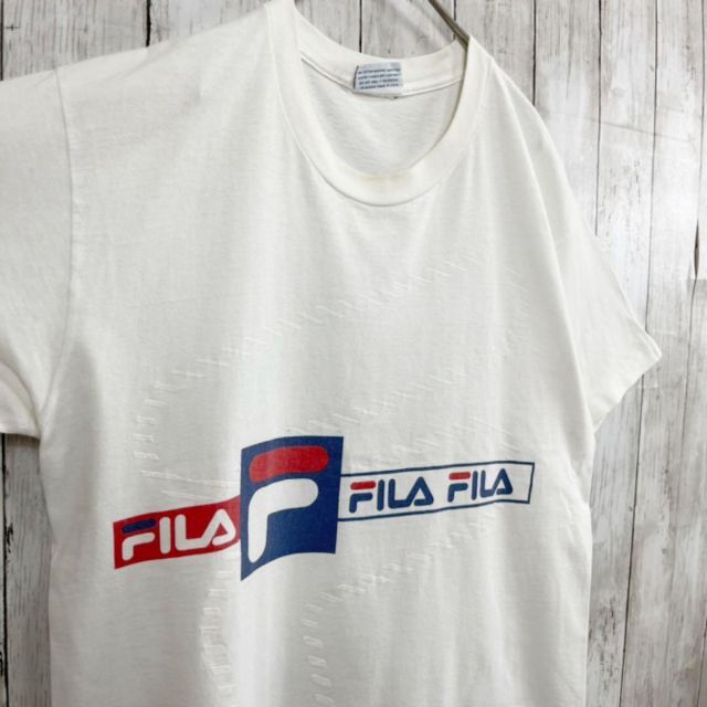 FILA(フィラ)の90sヴィンテージUSA製古着　FILAバックプリントTシャツ　サイズM 白 メンズのトップス(Tシャツ/カットソー(半袖/袖なし))の商品写真