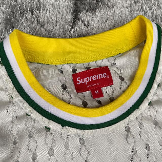 supreme perforated stripe warm up top