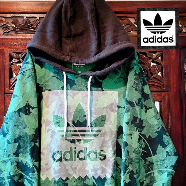 adidas(アディダス)のアディダス グリーン 花柄 パーカー ボタニカル 植物 ジャージ トレーナー メンズのトップス(パーカー)の商品写真