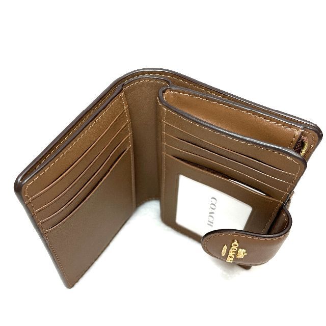 COACH(コーチ)の【新品】COACH コーチ　シグネチャー　キャンバス　二つ折り財布（カーキ） レディースのファッション小物(財布)の商品写真