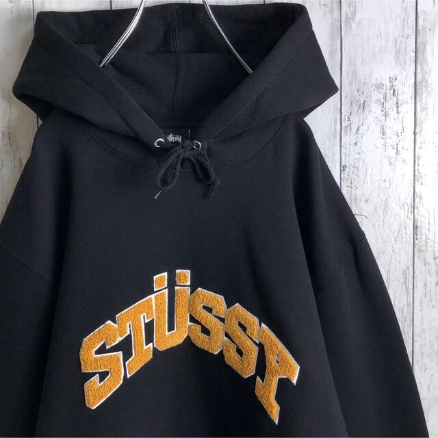 STUSSY パーカー パイルロゴ アーチロゴ 黒 Mツヴァイのメンズショップ