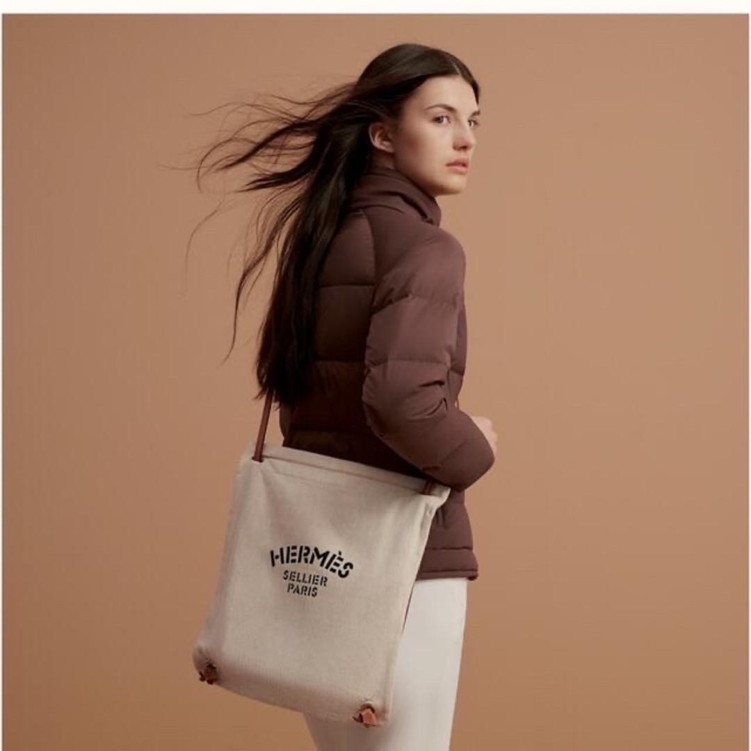 HERMES - エルメス リュック 斜めがけ ゴールド/クレ 新品未使用 HERMES - エルメス リュック 斜めがけ ゴールド/クレ 新品未使用