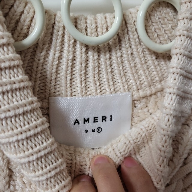 Ameri VINTAGE(アメリヴィンテージ)のAMERI レイヤード ケーブル ニットセット タートル未使用 アイボリー レディースのトップス(ニット/セーター)の商品写真