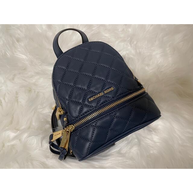 マイケルコース ミニバックパック ネイビー【美品】 - www.glycoala.com