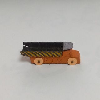 グリコ(グリコ)のグリコのおまけ　ダンプカー黒黃ストライプ(キャラクターグッズ)