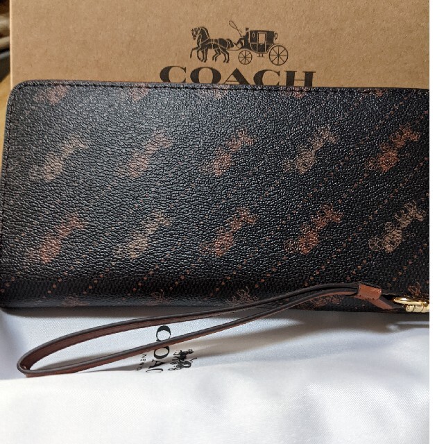 COACH  長財布　ラウンドファスナー　馬車濃いブラウン 1