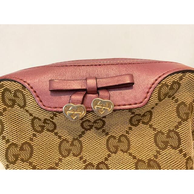 Gucci(グッチ)の美品　GUCCI ♡ GG柄×ピンクリボン ミニポーチ レディースのファッション小物(ポーチ)の商品写真