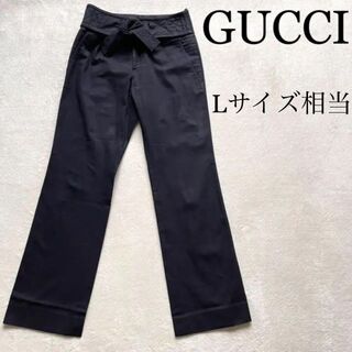 グッチ(Gucci)の270 GUCCI パンツ　黒　コットン100% リボン　40サイズ(カジュアルパンツ)