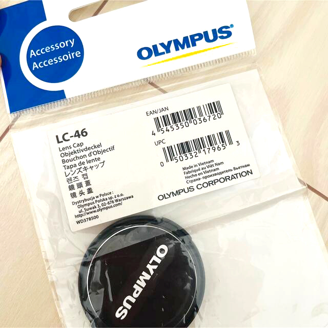 OLYMPUS(オリンパス)の【新品】LC-46 オリンパス 12mm2.0用レンズキャップ スマホ/家電/カメラのカメラ(その他)の商品写真