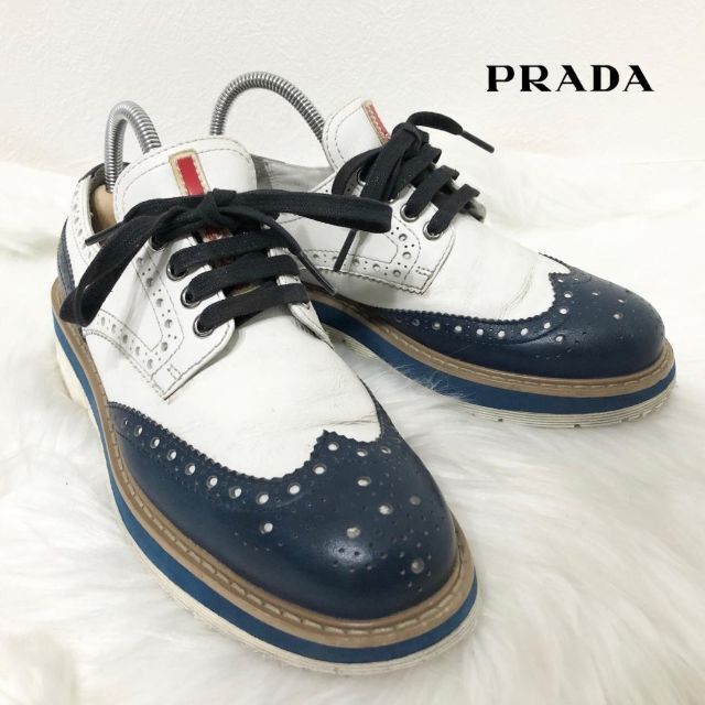 プラダ PRADA レザー スニーカー ウイングチップ