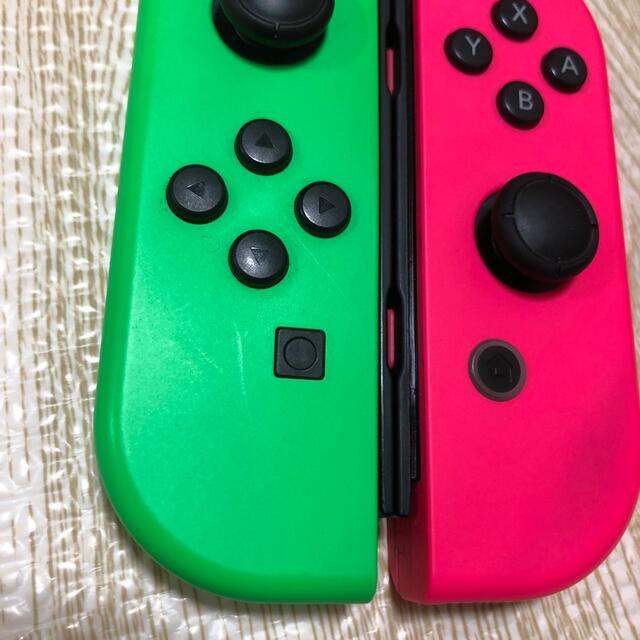 Nintendo Switch(ニンテンドースイッチ)の任天堂　Switch ジョイコン　ジャンク品　ネオングリーン/ネオンピンク エンタメ/ホビーのゲームソフト/ゲーム機本体(携帯用ゲーム機本体)の商品写真