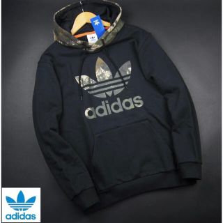 アディダス(adidas)のadidas カモフラ パーカー(パーカー)