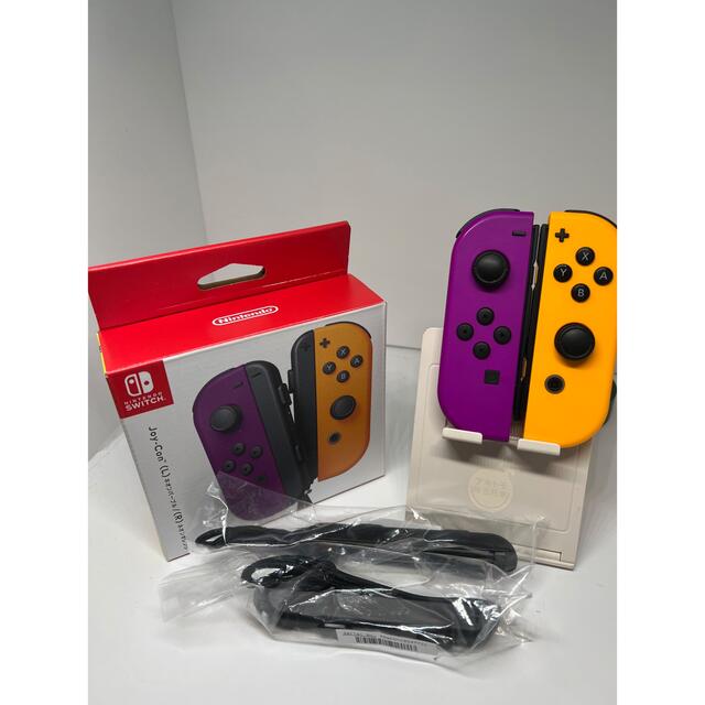 Nintendo Switch(ニンテンドースイッチ)の人気カラー（パープル•オレンジ）Switch  ジョイコン　完品セット エンタメ/ホビーのゲームソフト/ゲーム機本体(家庭用ゲーム機本体)の商品写真