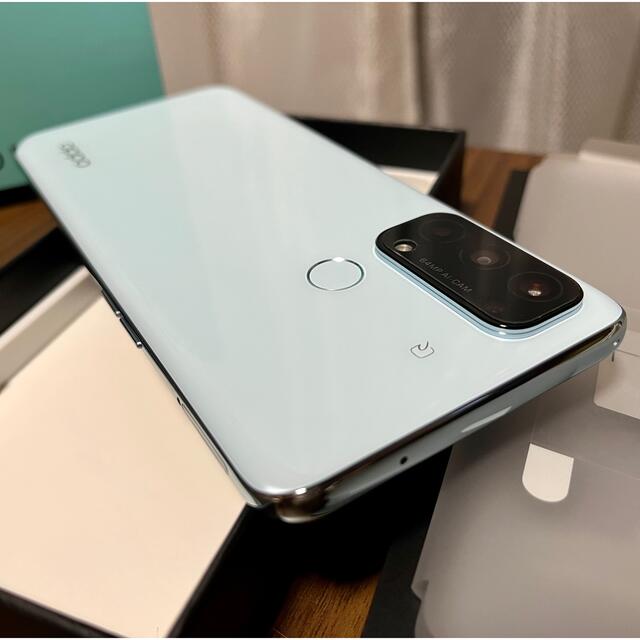 OPPO(オッポ)の美品 OPPO Reno5 A COH2199 simフリー 版 アイスブルー  スマホ/家電/カメラのスマートフォン/携帯電話(スマートフォン本体)の商品写真