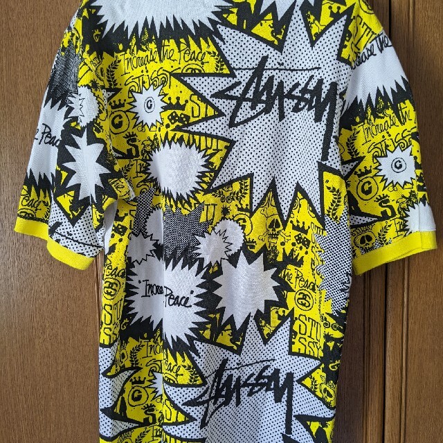 STUSSY(ステューシー)のSTUSSY　半袖ポロシャツ　黄色　黒色　白色　総柄　Mサイズ　スカル　ドクロ メンズのトップス(ポロシャツ)の商品写真