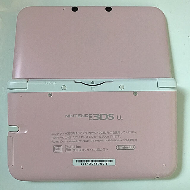 任天堂(ニンテンドウ)のNINTENDO 3DS LL 本体 ピンク×ホワイト エンタメ/ホビーのゲームソフト/ゲーム機本体(携帯用ゲーム機本体)の商品写真