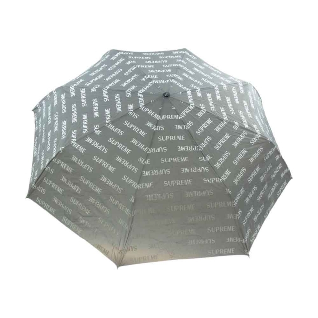 Supreme(シュプリーム)のSupreme シュプリーム  16W ShedRain Reflective Repeat Umbrella シェドレイン リフレクター ロゴ総柄 ワンタッチ 折り畳み傘 アンブレラ グレー系 【中古】 メンズのアクセサリー(その他)の商品写真