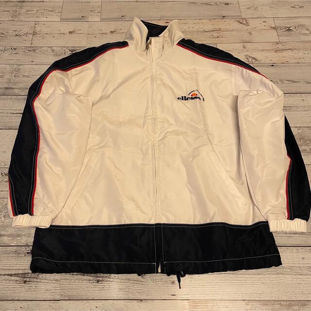 ellesse(エレッセ)の希少 ellesse ロゴ バイカラー ヴィンテージ ナイロン ジャケット メンズのジャケット/アウター(ナイロンジャケット)の商品写真