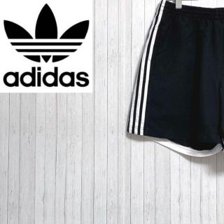 アディダス(adidas)のadidas　アディダス　ショートパンツ　スポーツ　万国旗タグ　ブラック　M(ショートパンツ)