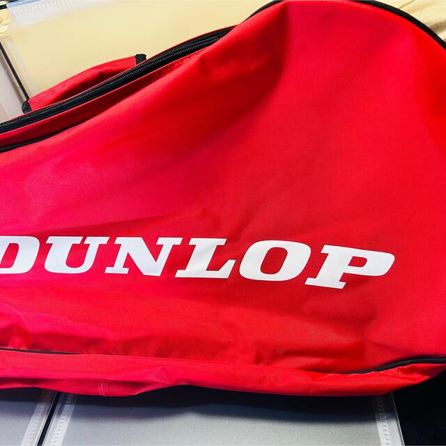 DUNLOP(ダンロップ)の美品　DUNLOP テニスバッグ　赤 スポーツ/アウトドアのテニス(バッグ)の商品写真