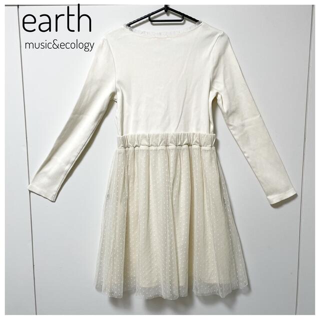 earth music & ecology(アースミュージックアンドエコロジー)の【アースミュージック】フロントリボンチュールドッキングワンピース　ガーリー　白 レディースのワンピース(ミニワンピース)の商品写真