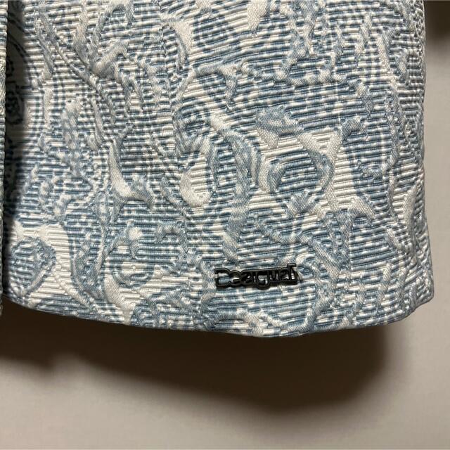 DESIGUAL(デシグアル)のDesigual デシグアル　ロングコート　ロゴ釦　スタンドカラー　総柄 レディースのジャケット/アウター(ロングコート)の商品写真