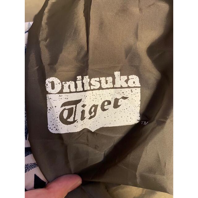 Onitsuka Tiger(オニツカタイガー)の【最終値下げ！】Onitsuka Tiger  オニツカタイガー　レインポンチョ レディースのジャケット/アウター(ポンチョ)の商品写真