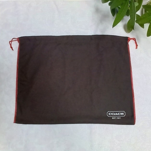 COACH　巾着型　保存袋 レディースのバッグ(ショップ袋)の商品写真