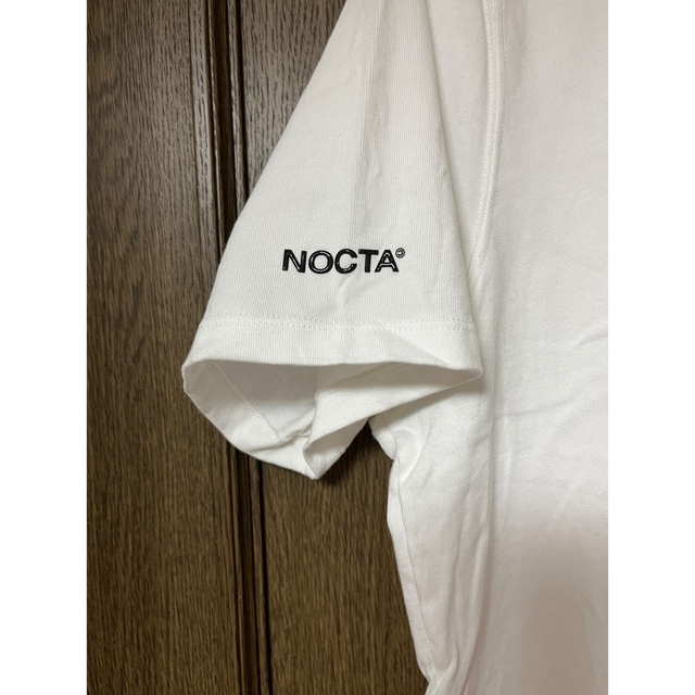 NIKE(ナイキ)のNIKE✖︎NOCTA ホワイトTシャツ　L メンズのトップス(Tシャツ/カットソー(半袖/袖なし))の商品写真