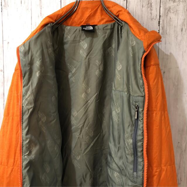 THE NORTH FACE(ザノースフェイス)のノースフェイスダウンジャケット薄手　オレンジ　メンズM  レディースXL相当 メンズのジャケット/アウター(ダウンジャケット)の商品写真