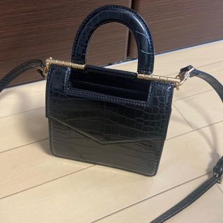 チャールズアンドキース(Charles and Keith)のミニクロックエフェクトエンベロープバッグ(ショルダーバッグ)