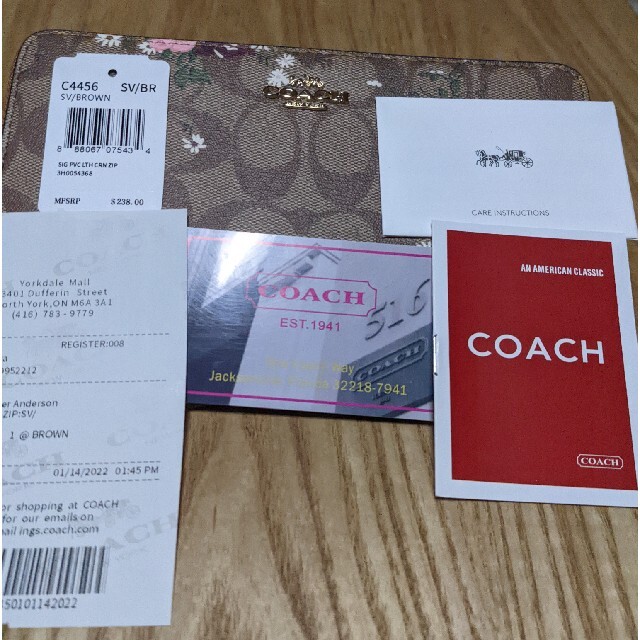 COACH(コーチ)のCOACH  長財布　シグネチャー　小さな花柄模様 レディースのファッション小物(財布)の商品写真