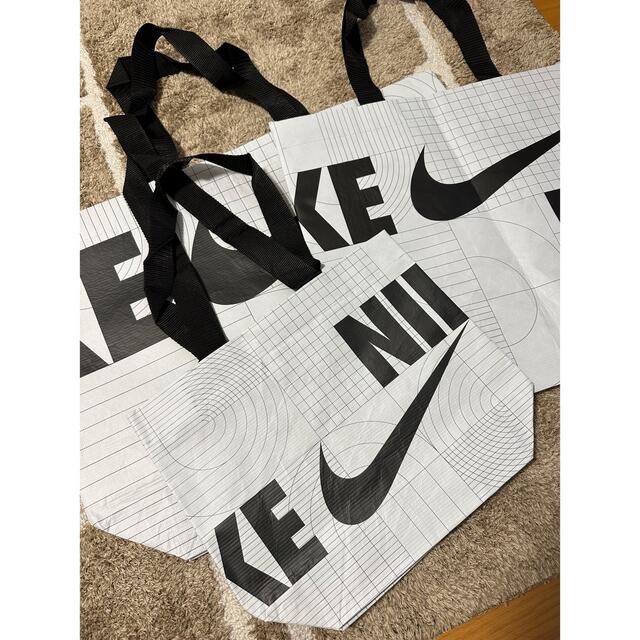 NIKE(ナイキ)のM様専用　Nike バッグ　S/M 2枚セット レディースのバッグ(エコバッグ)の商品写真