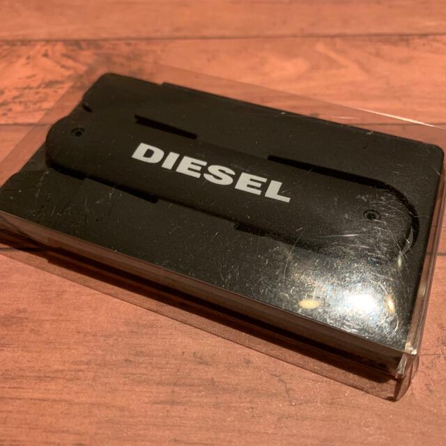 DIESEL(ディーゼル)の値下げ中です⚠️『DIESEL』スマホスタンド スマホ/家電/カメラのスマホアクセサリー(その他)の商品写真