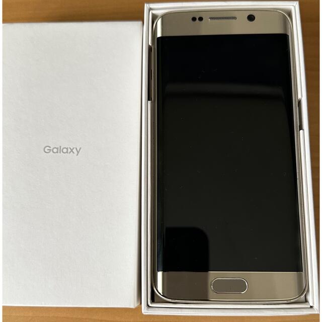 Galaxy(ギャラクシー)のGalaxy S6 edge Gold  32 GB 404SC スマホ/家電/カメラのスマートフォン/携帯電話(スマートフォン本体)の商品写真