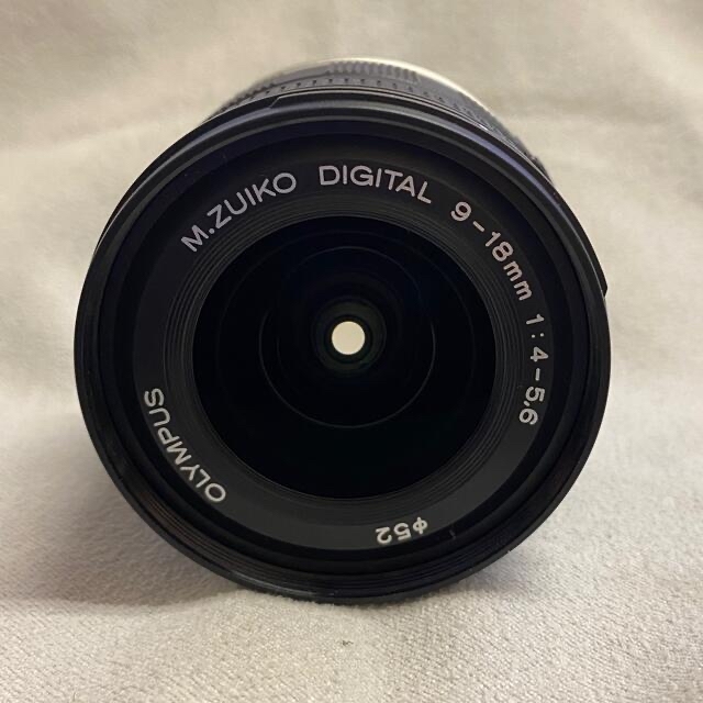 OLYMPUS(オリンパス)のkenken様専用M.Zuiko 9-18mm f/4.0-5.6 美品 スマホ/家電/カメラのカメラ(レンズ(ズーム))の商品写真