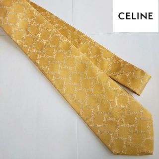 セリーヌ(celine)の未使用に近い　セリーヌ　イエロー　ロゴ　シルク　イタリア製(ネクタイ)