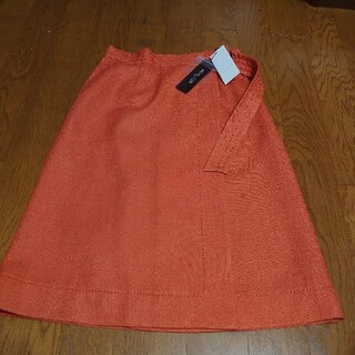 エムケーミッシェルクラン(MK MICHEL KLEIN)の新品MICHEL KLEINオレンジスカートです。(ひざ丈スカート)