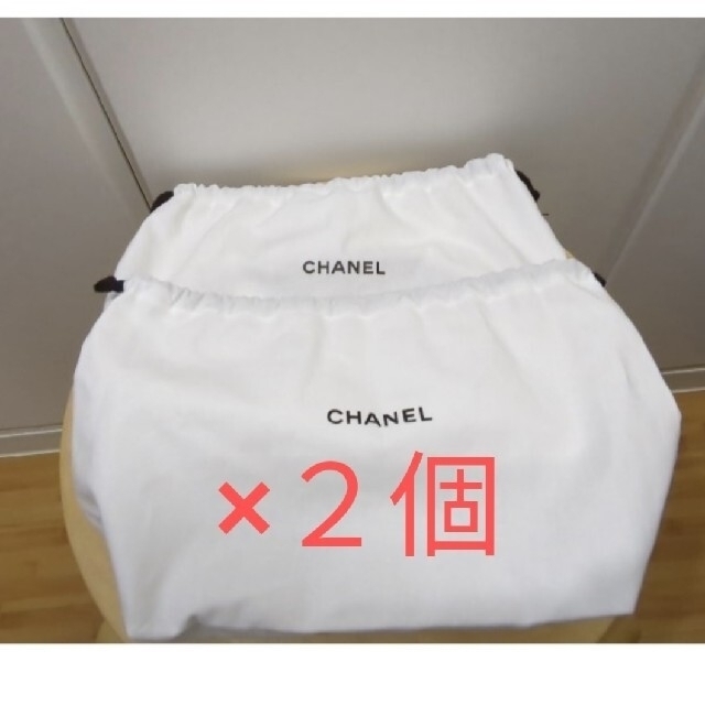 CHANEL(シャネル)の２個　chanel シャネル 公式 巾着 袋 白 ショップ ショッピング袋 レディースのファッション小物(ポーチ)の商品写真
