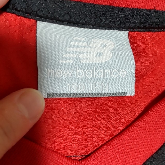 New Balance(ニューバランス)の美品　ニューバランス　シャツ　長袖　150 160 プーマ　アディダス　ナイキ スポーツ/アウトドアのサッカー/フットサル(ウェア)の商品写真