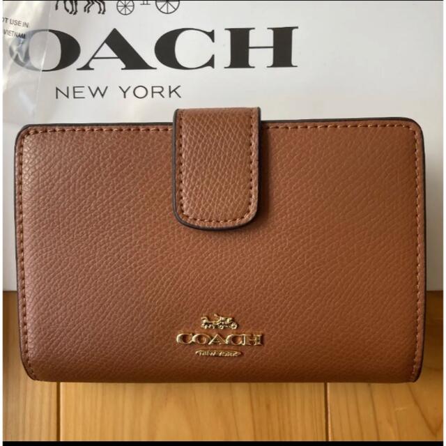 COACH(コーチ)のcoach コーチ　二つ折り財布　シグネチャー　カーキ　サドル　ブラウン　茶色 レディースのファッション小物(財布)の商品写真